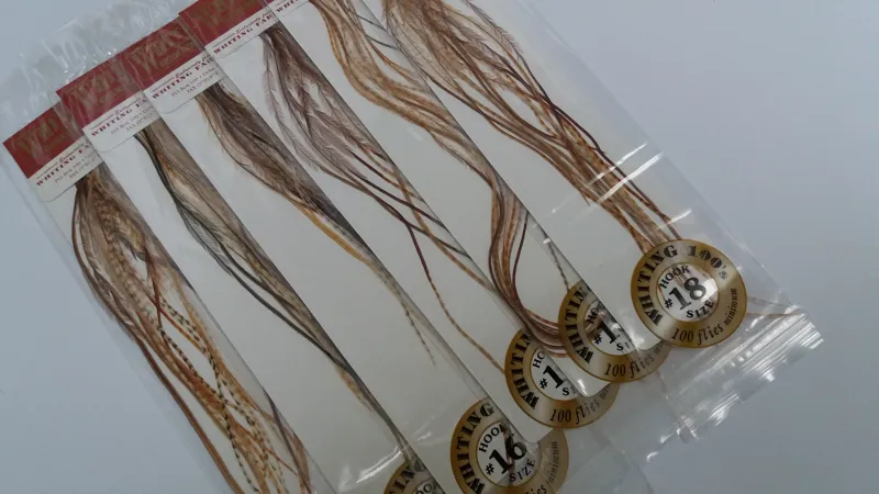 Whiting 100 Saddle Hackle Pack in Barred Dark Ginger